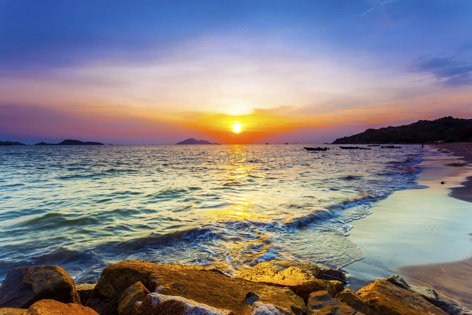 Sunset over the beach with colorful sky