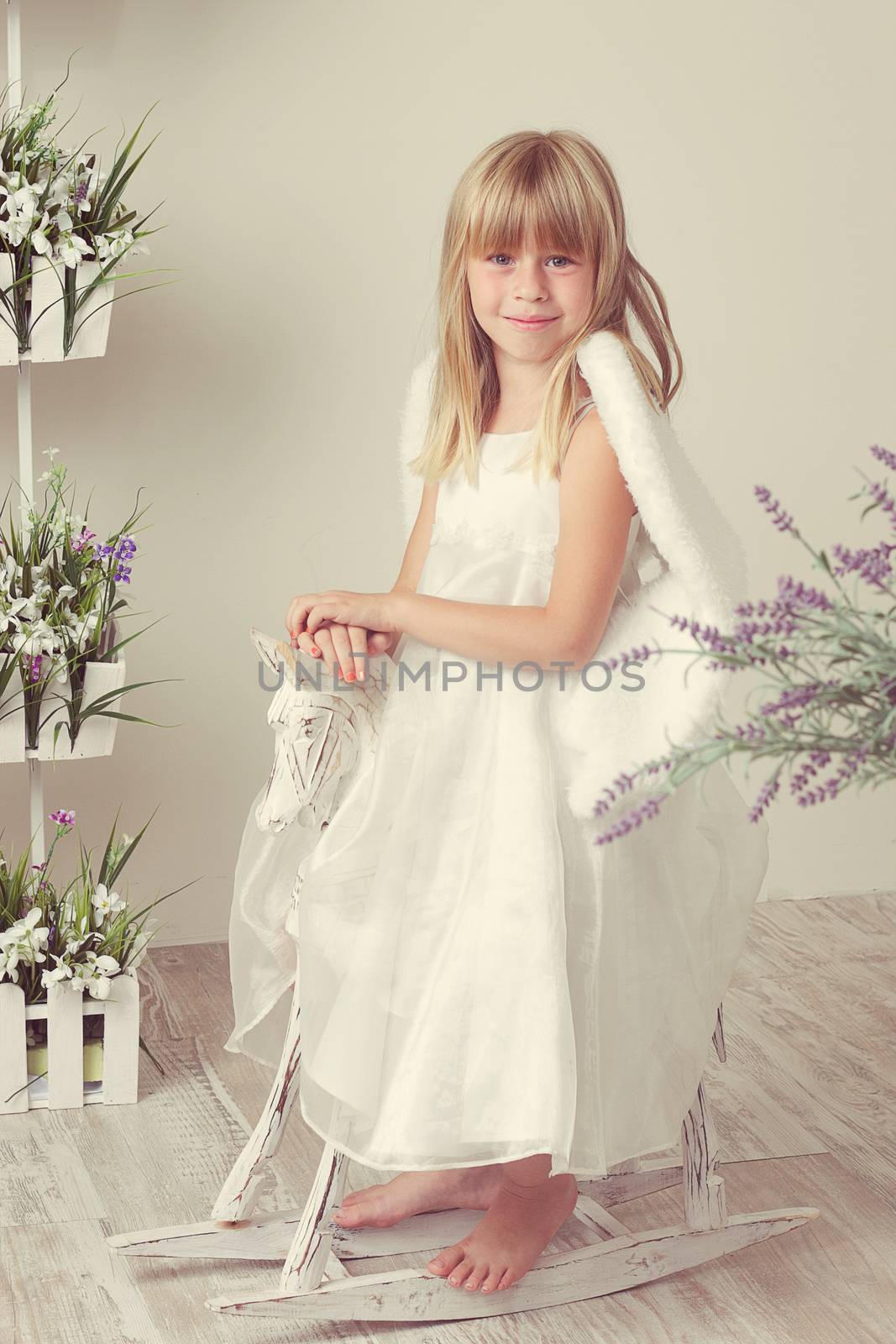 a Baby girl in an angel dress