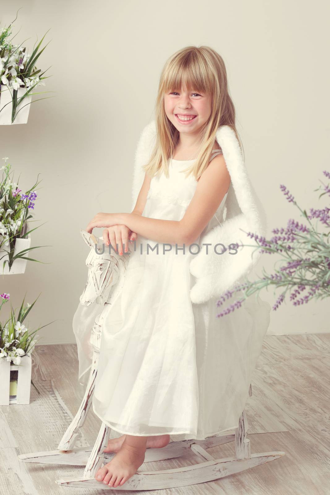 a Baby girl in an angel dress