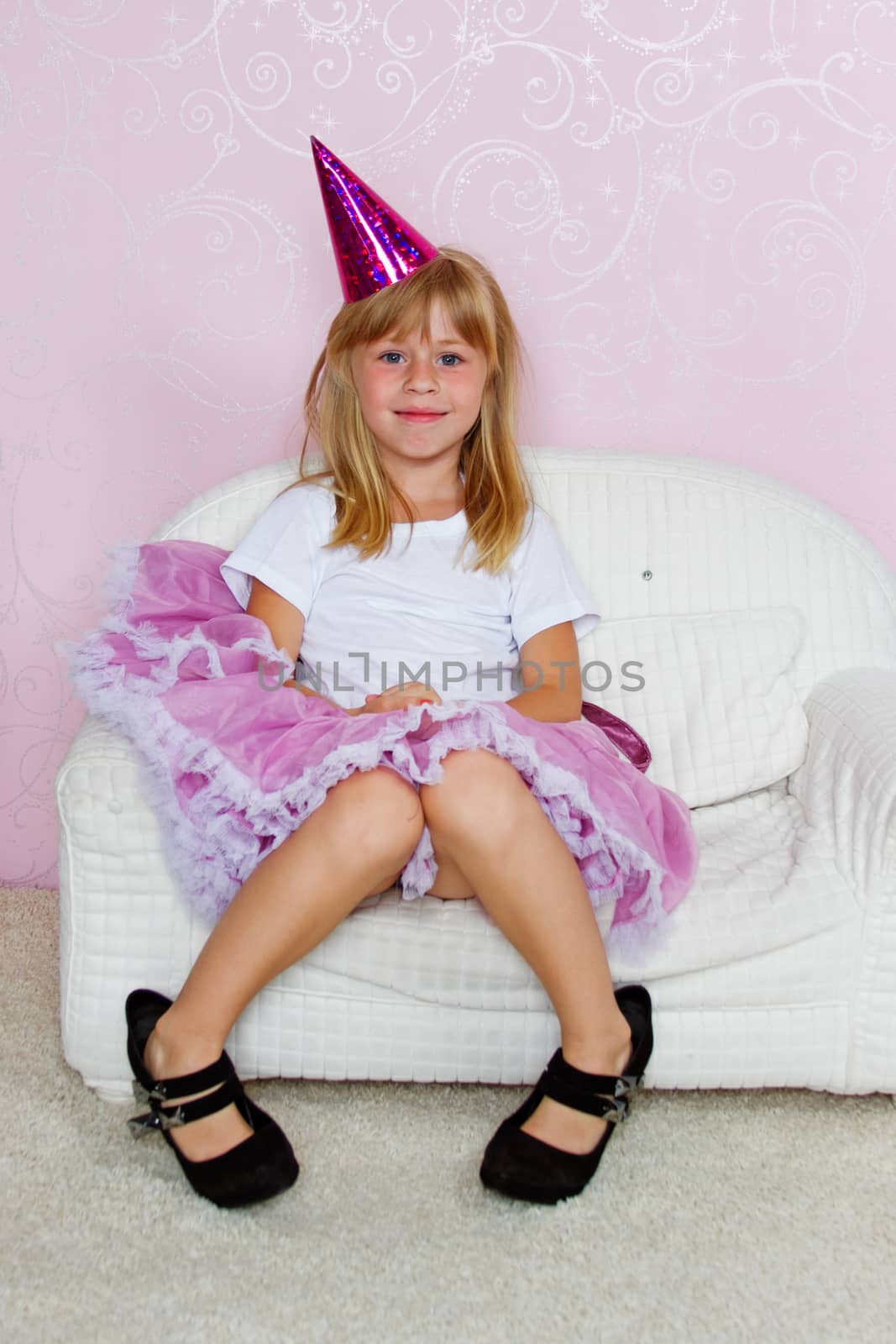 Pretty joyful kid girl on Holiday party