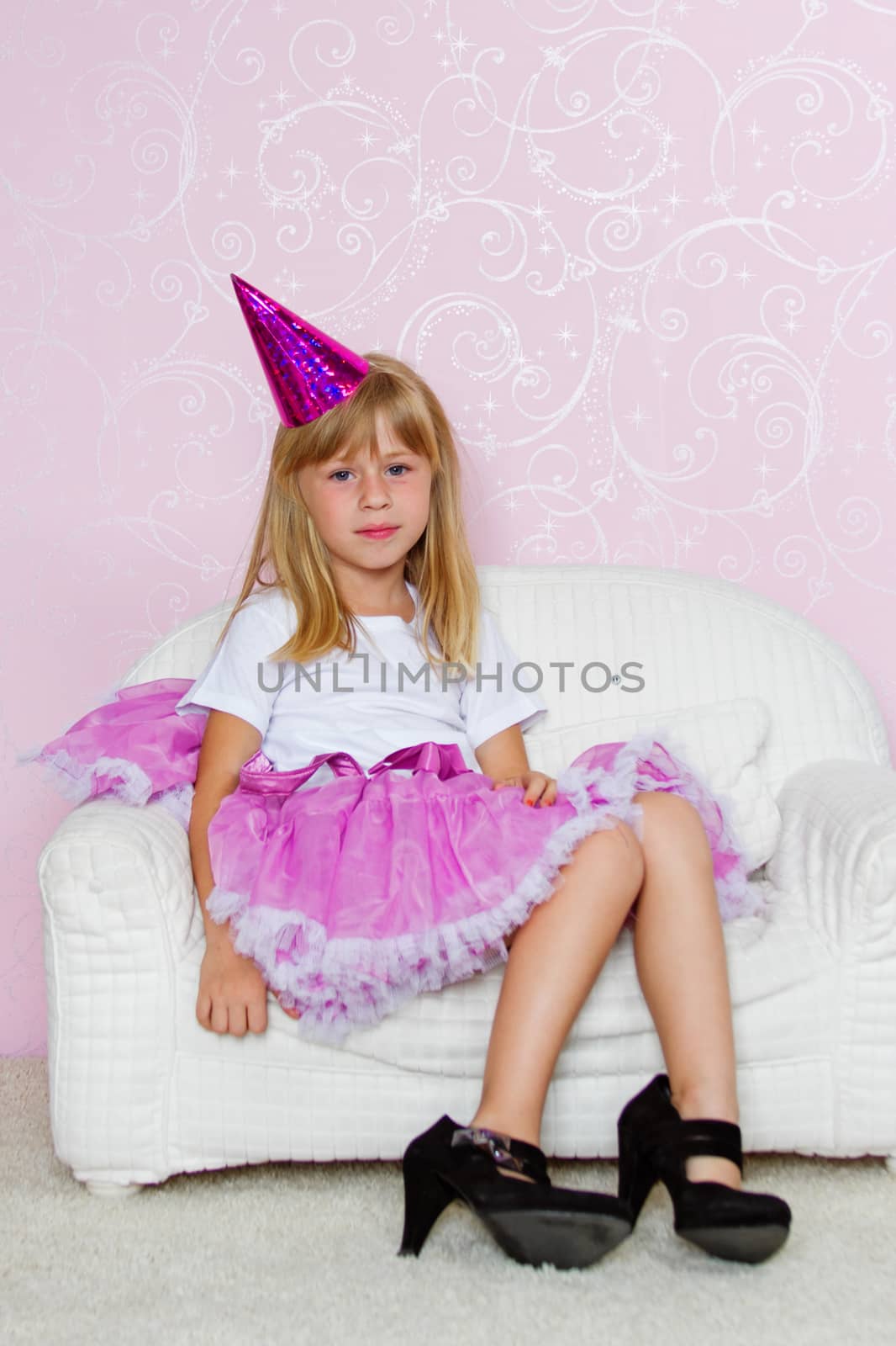Pretty joyful kid girl on Holiday party