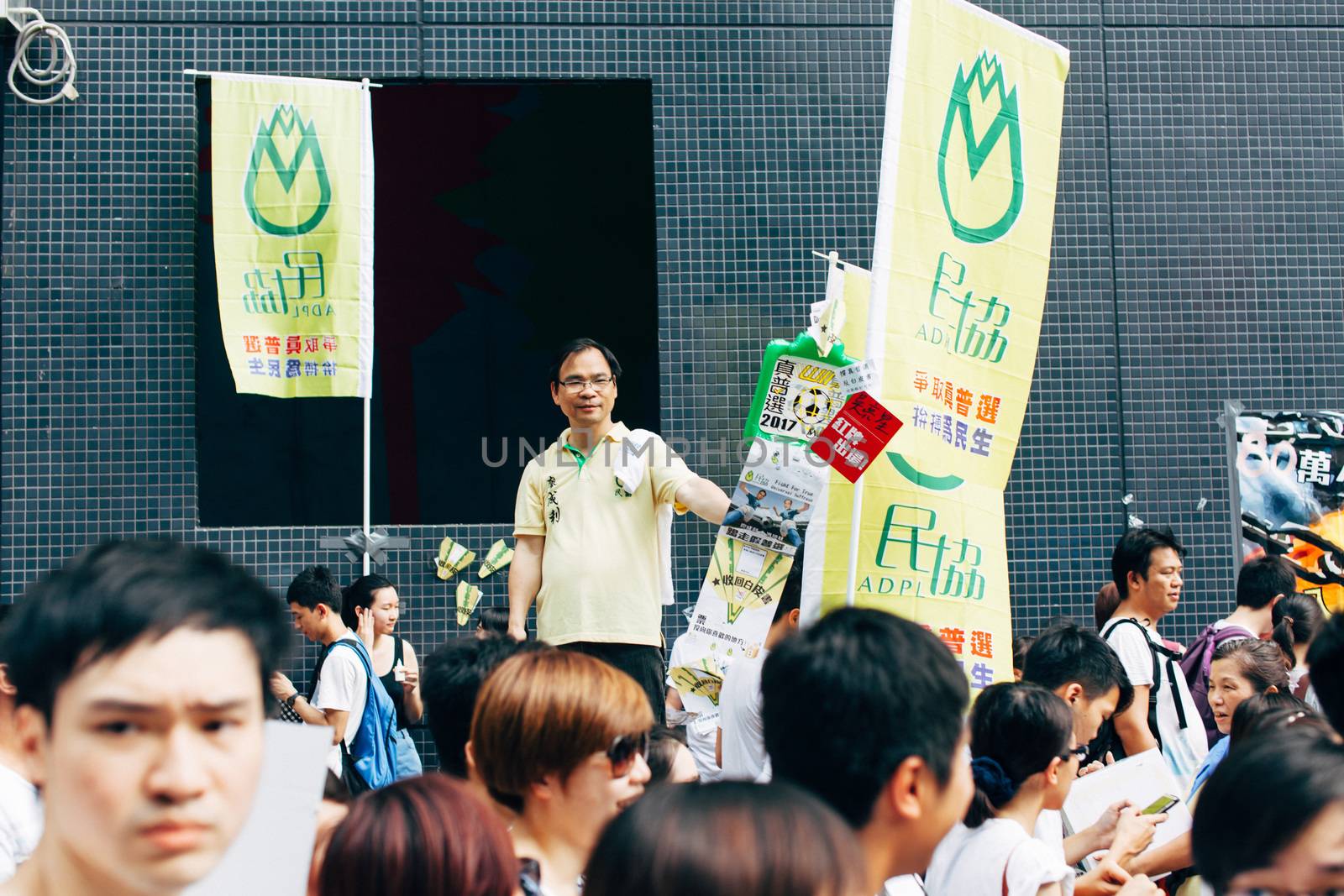 HONG KONG - JULY 1: Hong Kong people seek greater democracy as frustration grows over the influence of Beijing on July 1, 2014 in Hong Kong. Organizers of protest claimed a turnout of 510,000 people.