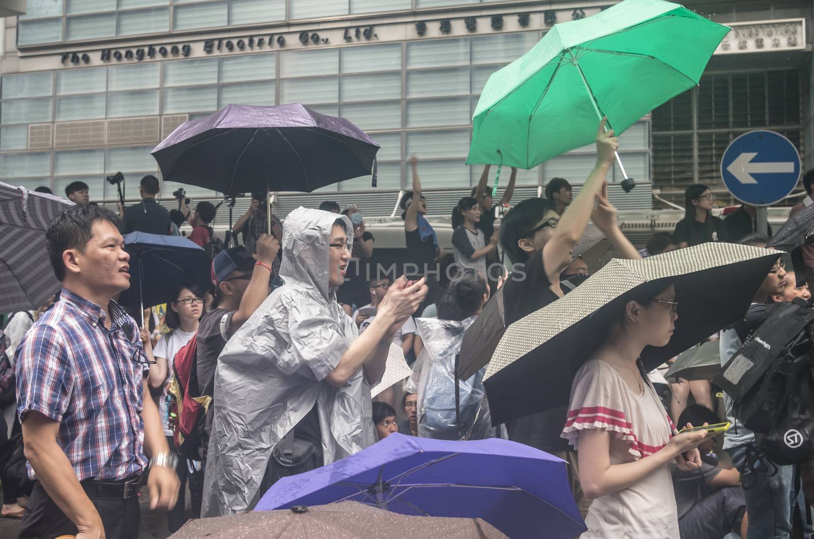 HONG KONG - JUNE 20: Protesters gathered outside the government headquarters on June 20, 2014 in Hong Kong. The Finance Committee is vetting a funding request about northeast New Territories.