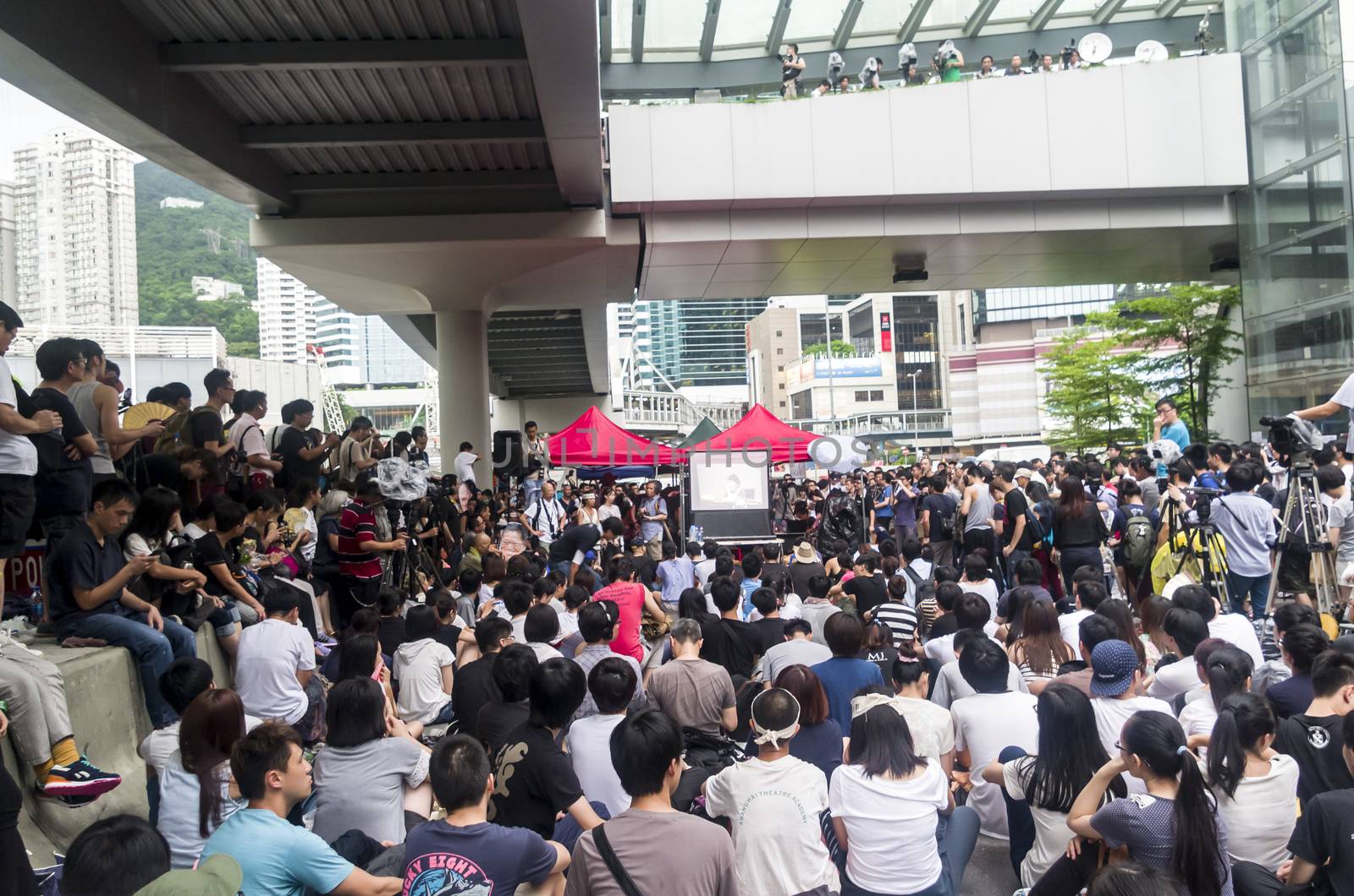HONG KONG - JUNE 20: Protesters gathered outside the government headquarters on June 20, 2014 in Hong Kong. The Finance Committee is vetting a funding request about northeast New Territories.