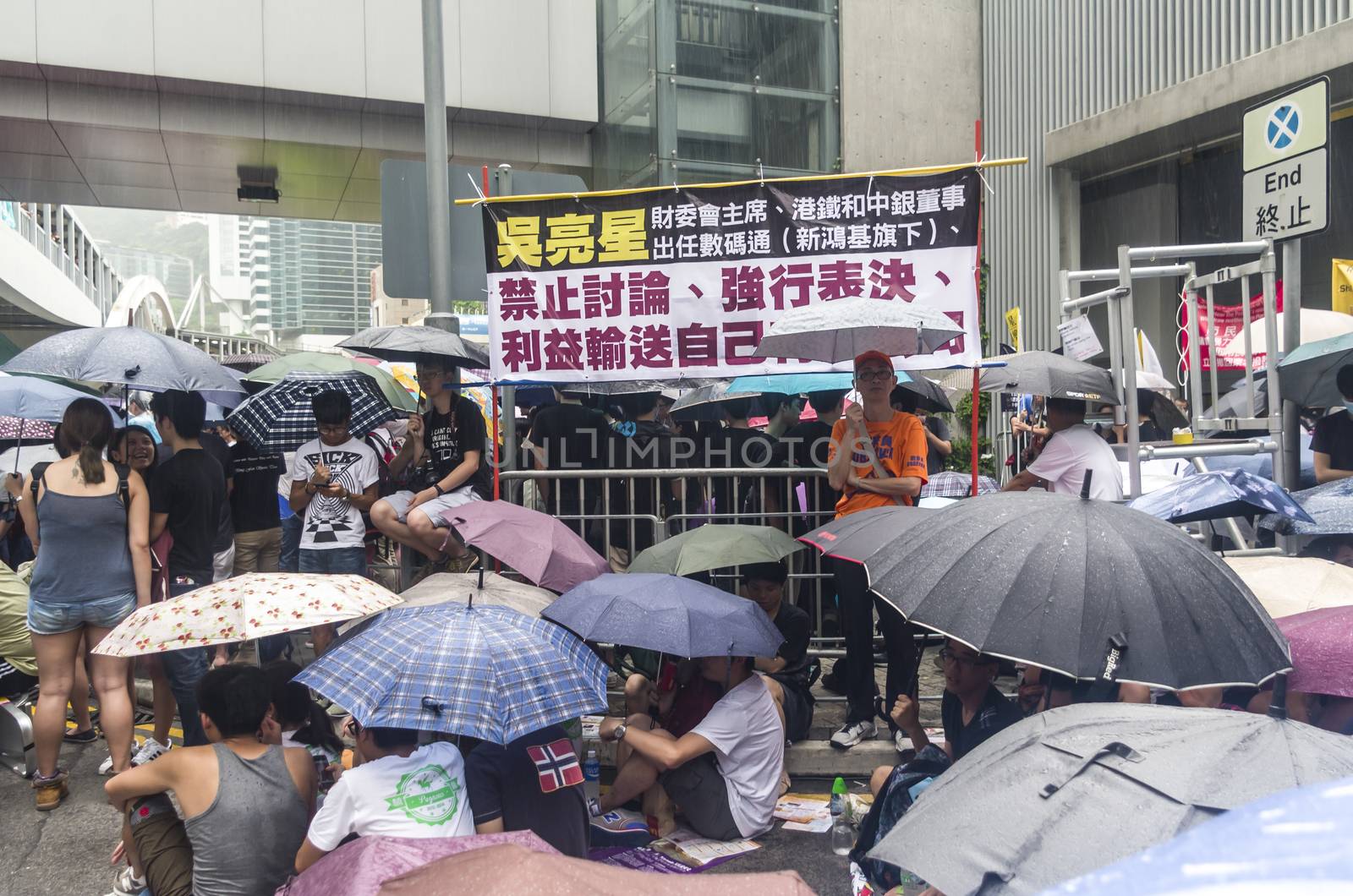 HONG KONG - JUNE 20: Protesters gathered outside the government headquarters on June 20, 2014 in Hong Kong. The Finance Committee is vetting a funding request about northeast New Territories.