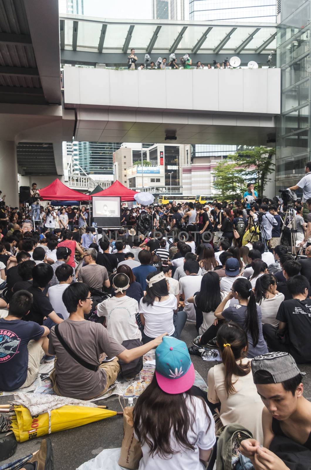 HONG KONG - JUNE 20: Protesters gathered outside the government headquarters on June 20, 2014 in Hong Kong. The Finance Committee meeting in the Legislative Council that is vetting an initial HK$340 million funding request to build two new towns in northeast New Territories in Hong Kong.