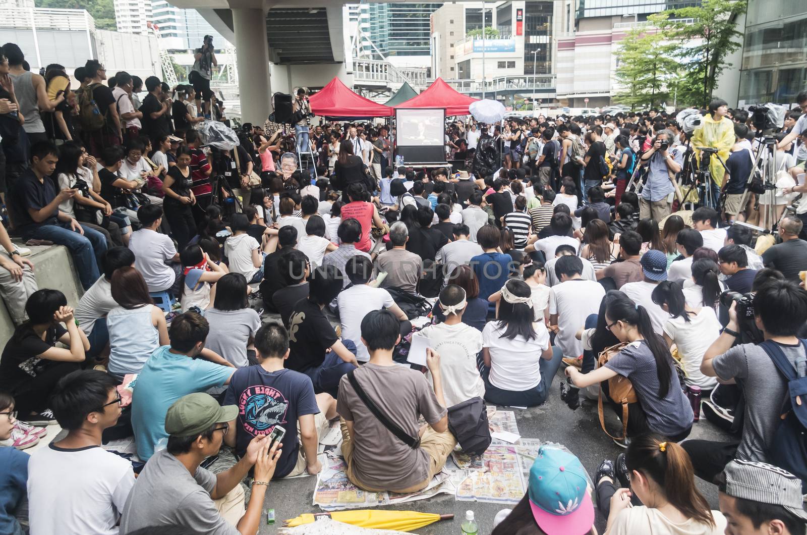 HONG KONG - JUNE 20: Protesters gathered outside the government headquarters on June 20, 2014 in Hong Kong. The Finance Committee meeting in the Legislative Council that is vetting an initial HK$340 million funding request to build two new towns in northeast New Territories in Hong Kong. 