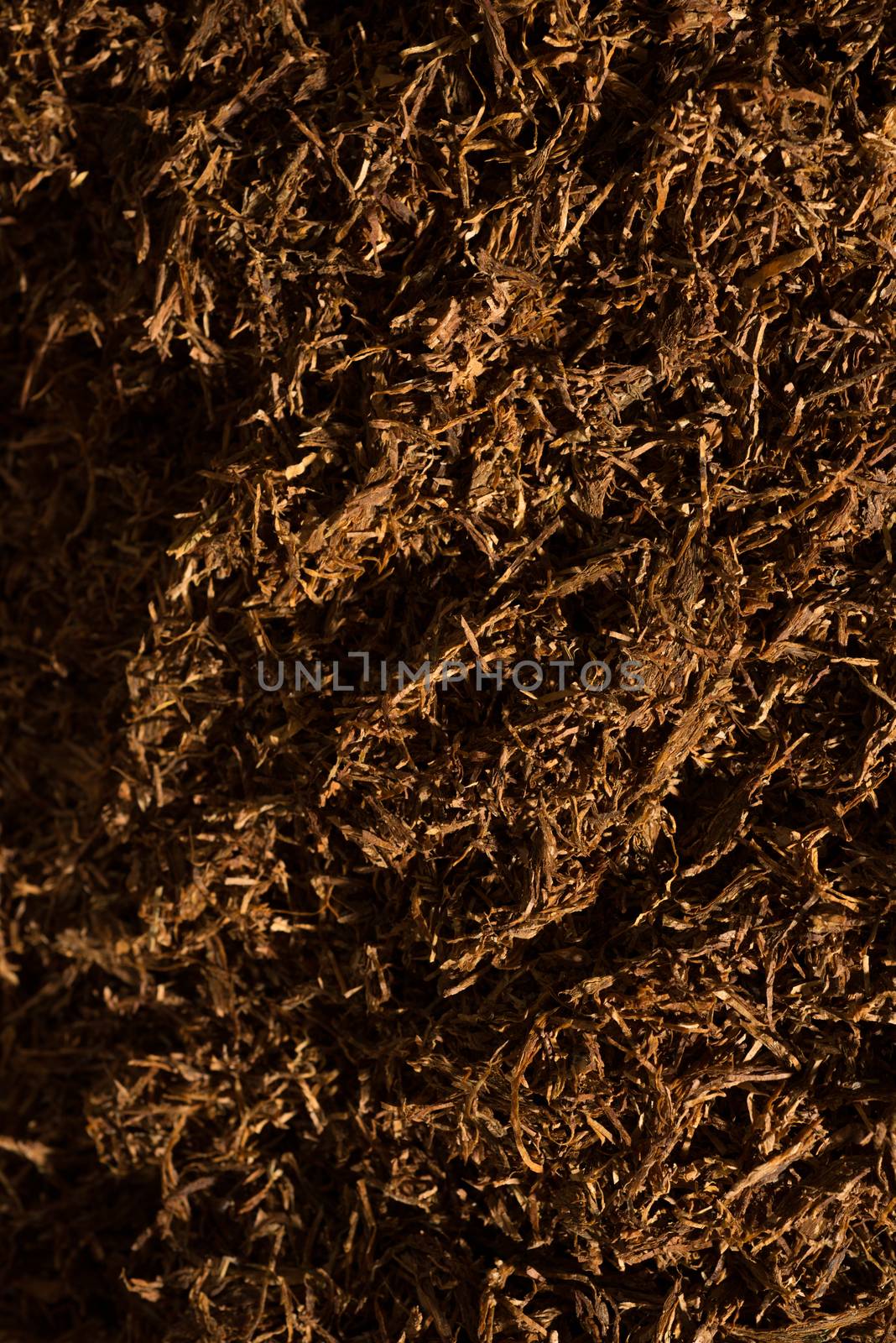 Fine cut tobacco detail inside a cigarette production machine