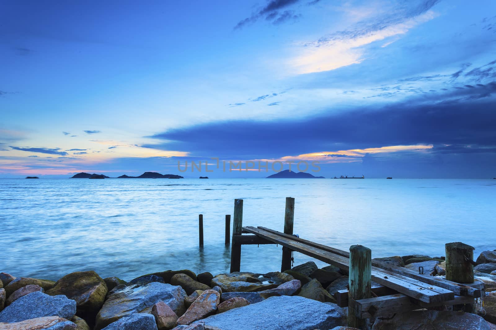 Sunset over a wooden bridge in Hong Kong