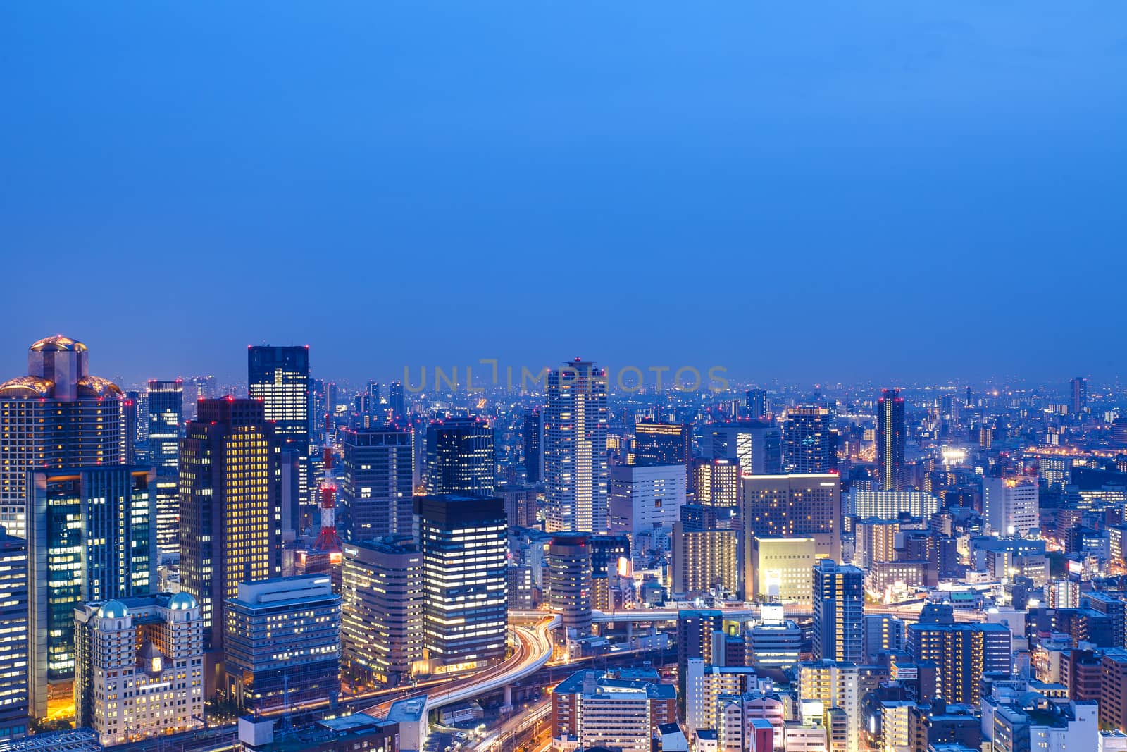 Dense skyline of Umeda District, Osaka, Japan. by kawing921