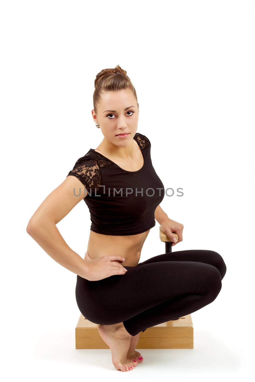 beauty contortionist prepare practicing gymnastic yoga isolated on white background, Young professional gymnast woman