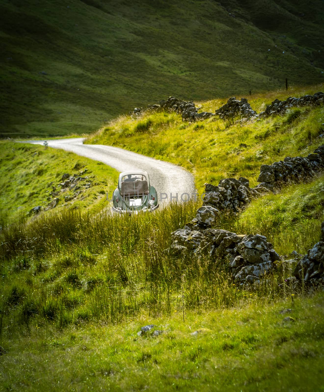 Retro Filtered Photo Of Vintage Car Touring The British Countryside Wilderness
