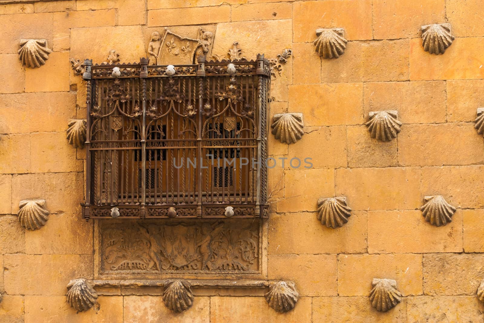 Detail of window with old forge in The House of Shells located in Salamanca Spain
