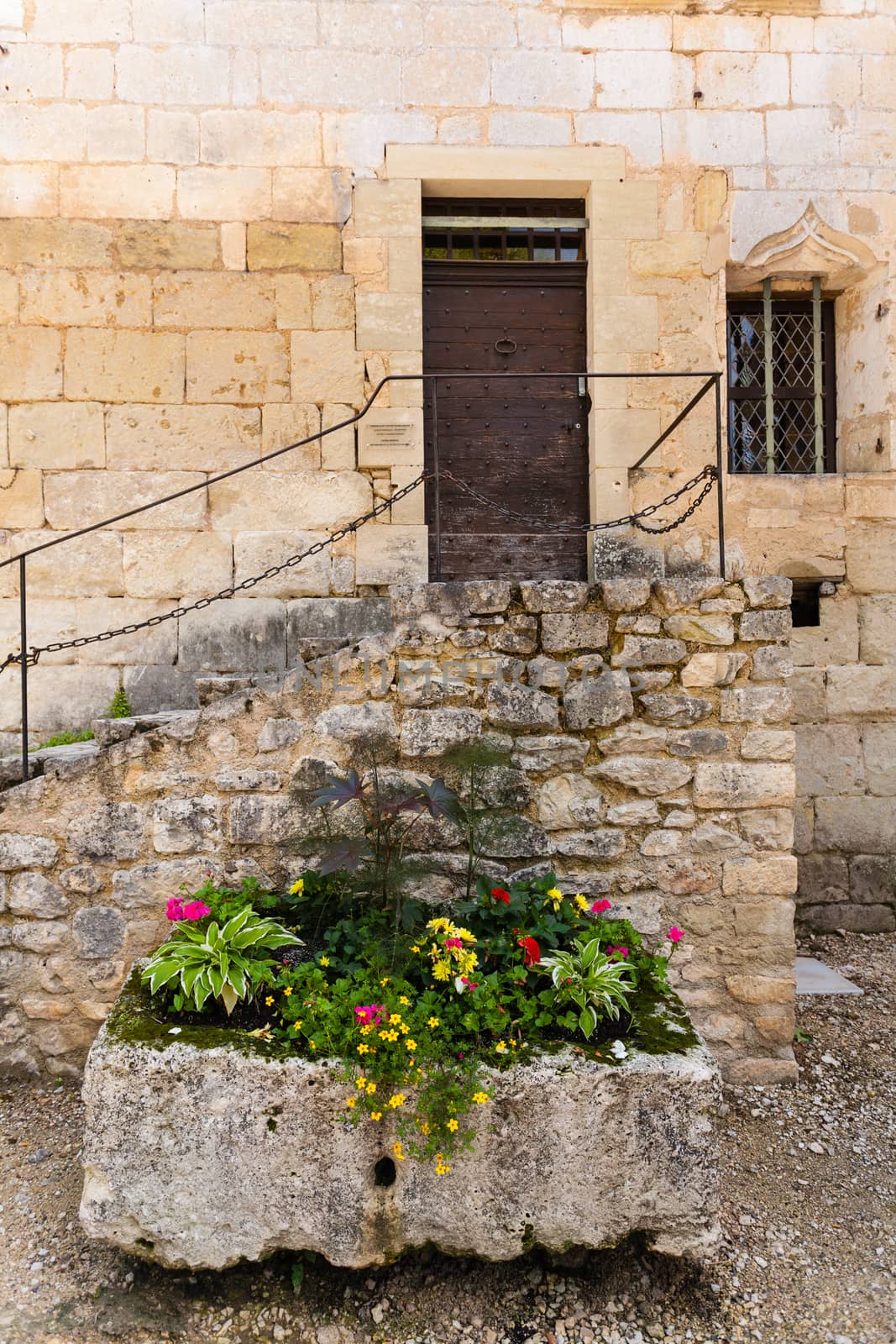 Beautiful colourful composed flower box with stairs at the bottom In Perigueux  in the french region of Dordogne