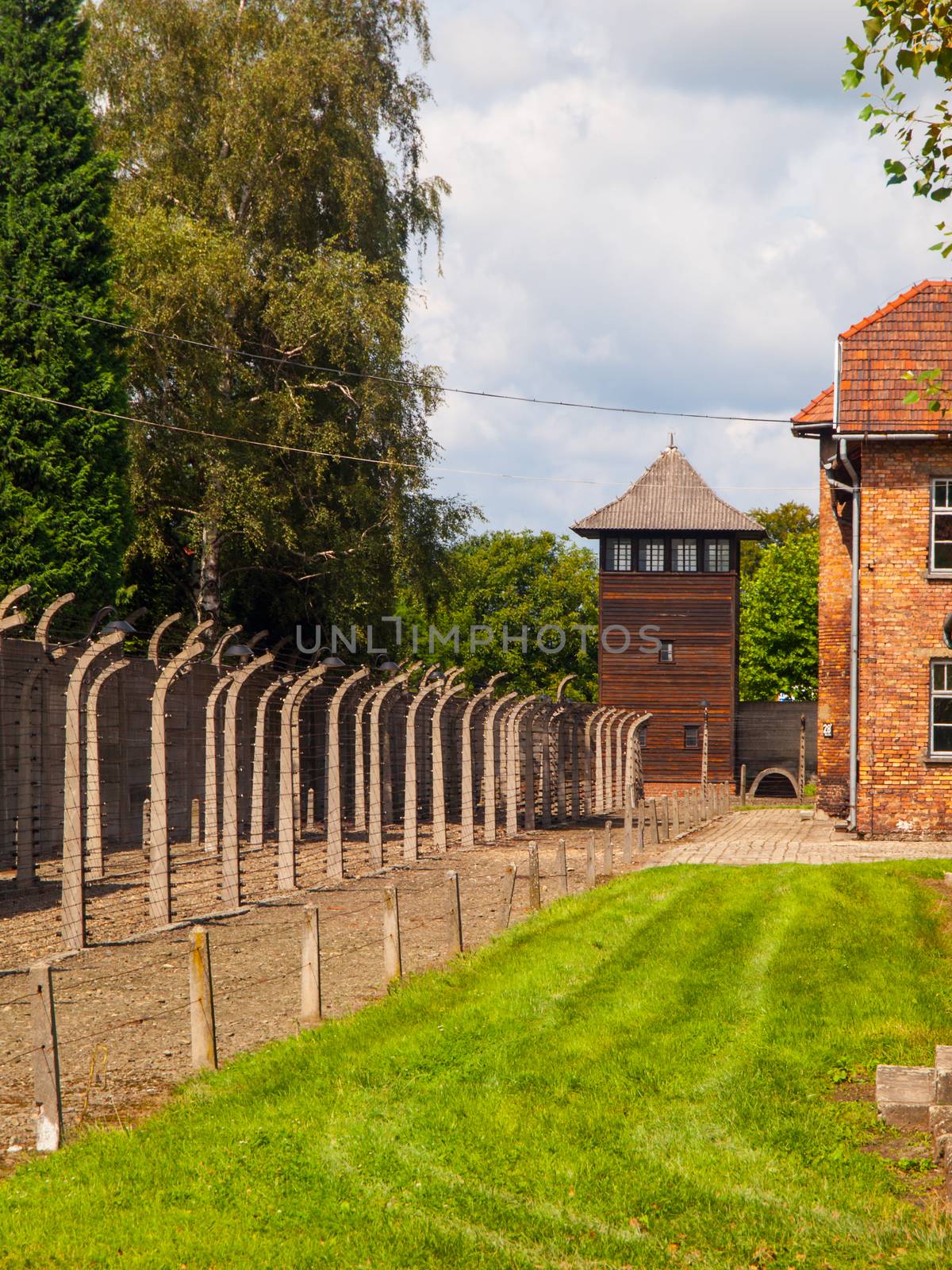 Fence and guard tower of concentration camp Auschwitz (Oswiecim)
