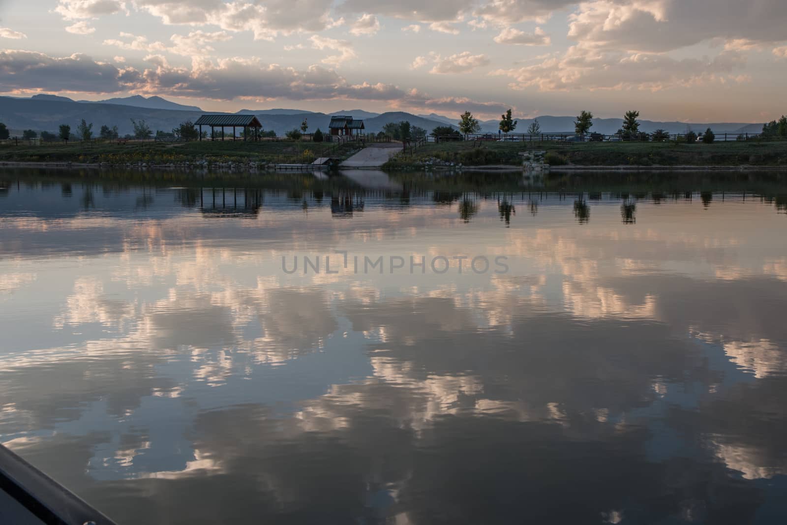 Beautiful reflection of the clouds on the water at Lagerman Reservoir in Longmont, Colorado