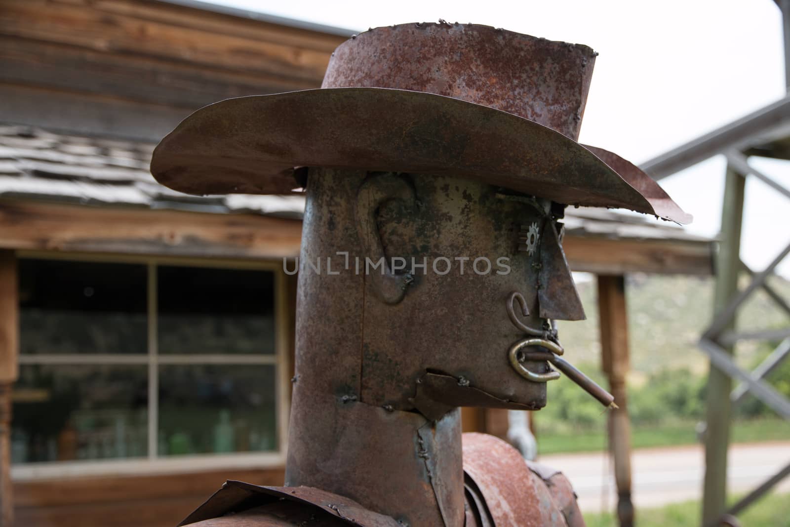 A metal statue of a Sherriff in Masonville, CO
