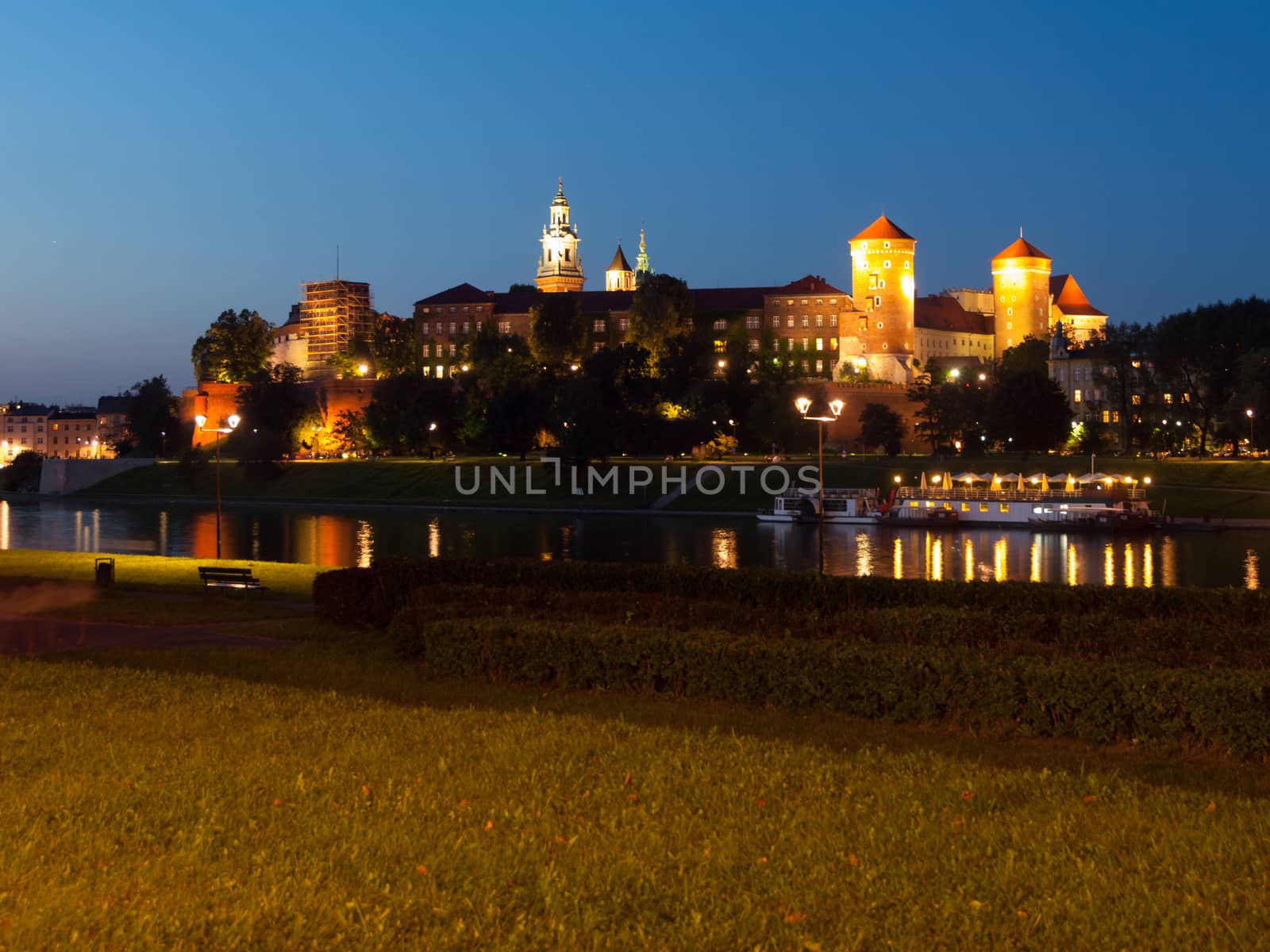 Wawel Castle and Vistula River in Krakow by night (Poland)