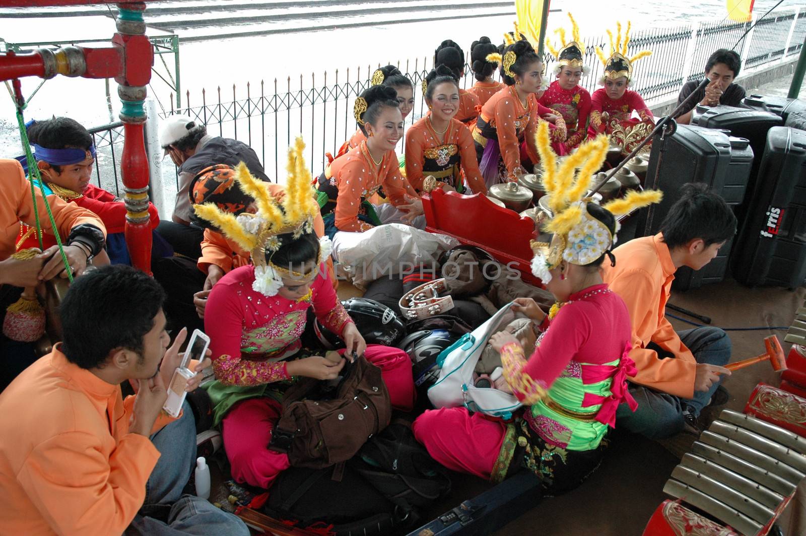 Bandung, Indonesia - March 9, 2008: Dancer member and musical crew gather together and make preparation before get performing on stage at Tegalega Park Bandung, West Java-Indonesia.