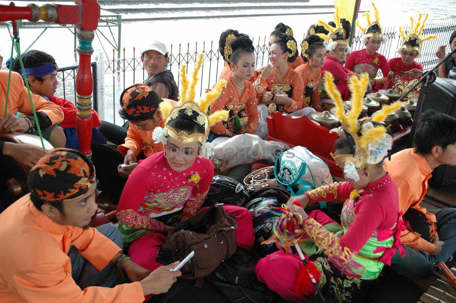 Bandung, Indonesia - March 9, 2008: Dancer member and musical crew gather together and make preparation before get performing on stage at Tegalega Park Bandung, West Java-Indonesia.