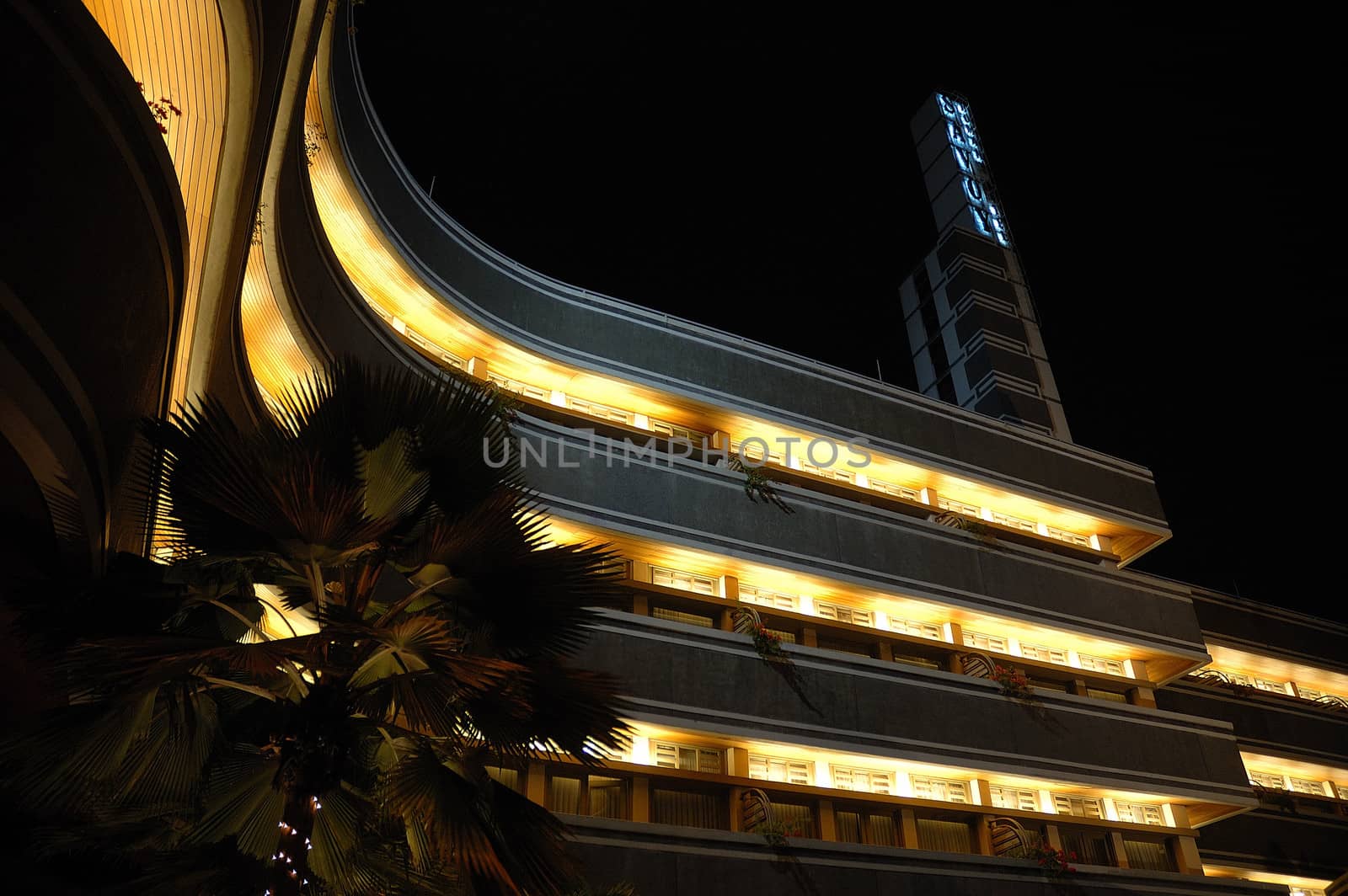 Bandung, Indonesia - October 3, 2007: Savoy Homann Hotel building exterior taken at night time.