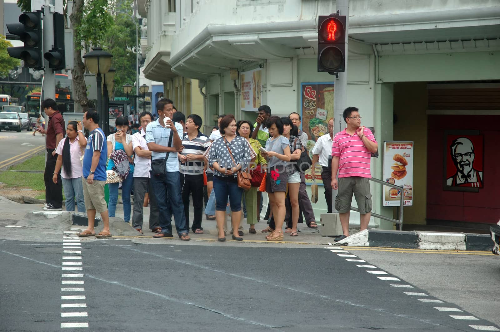 Singapore, Singapore - April 14, 2013: People crowd at Rochor road, Singapore.