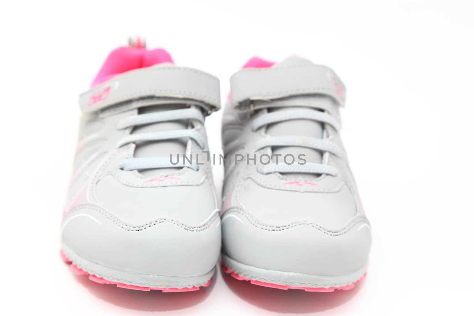 gray sneakers isolated on white