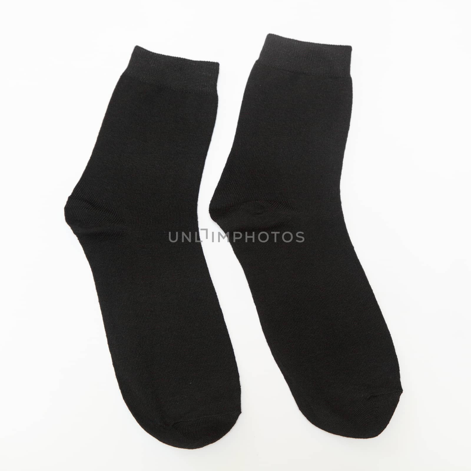 textile black socks on a white background