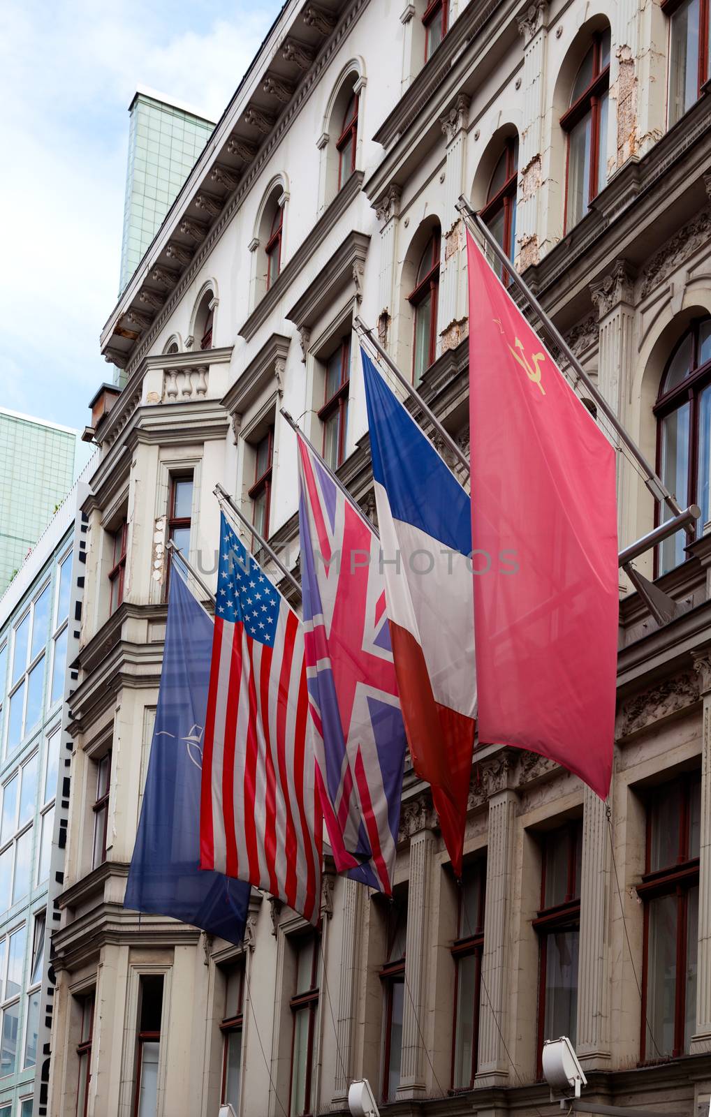 Allied flags in Checkpoint Charlie, Berlin by motorolka