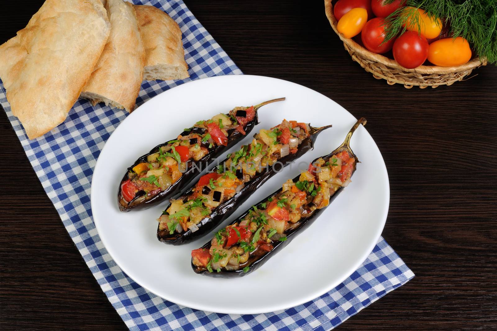 Appetizer of fried eggplant with tomatoes, parsley