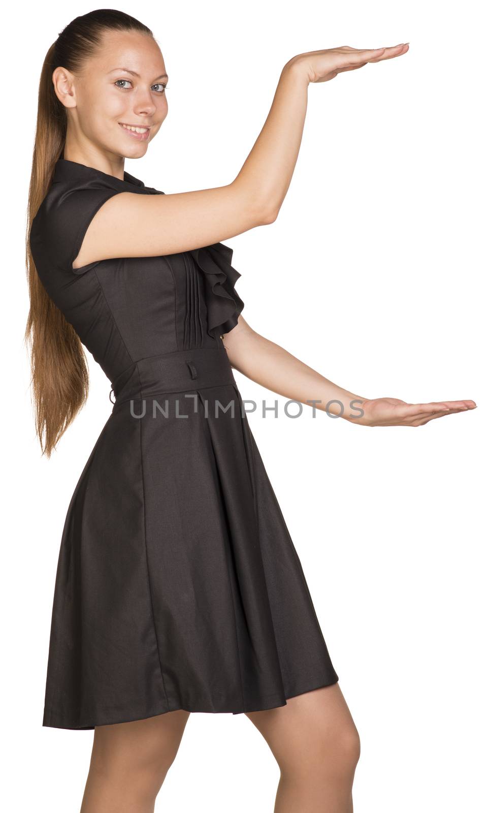Young beautiful happy woman holding big imaginary object between two hands. Isolated