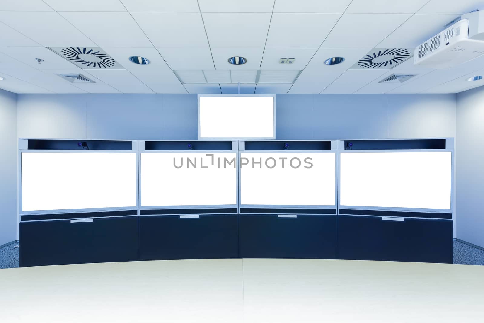 teleconferencing, video conference and telepresence business meeting room with blank screen display monitor