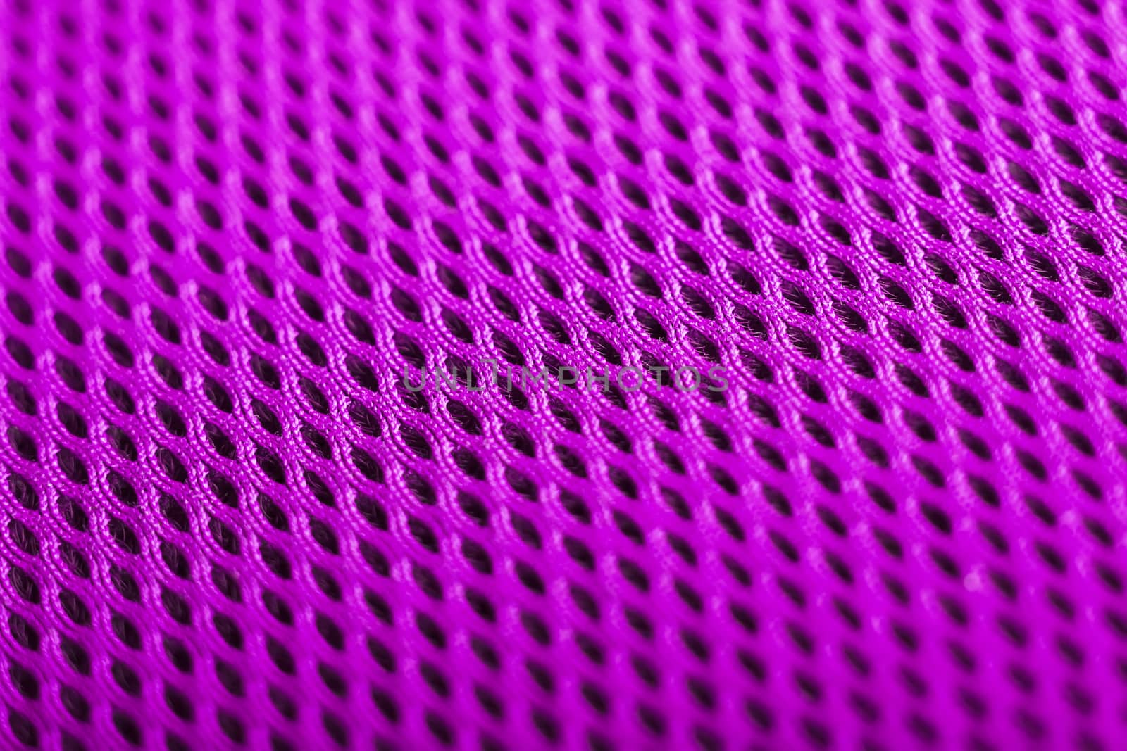magenta background. Mesh fabric texture. Macro by pzRomashka