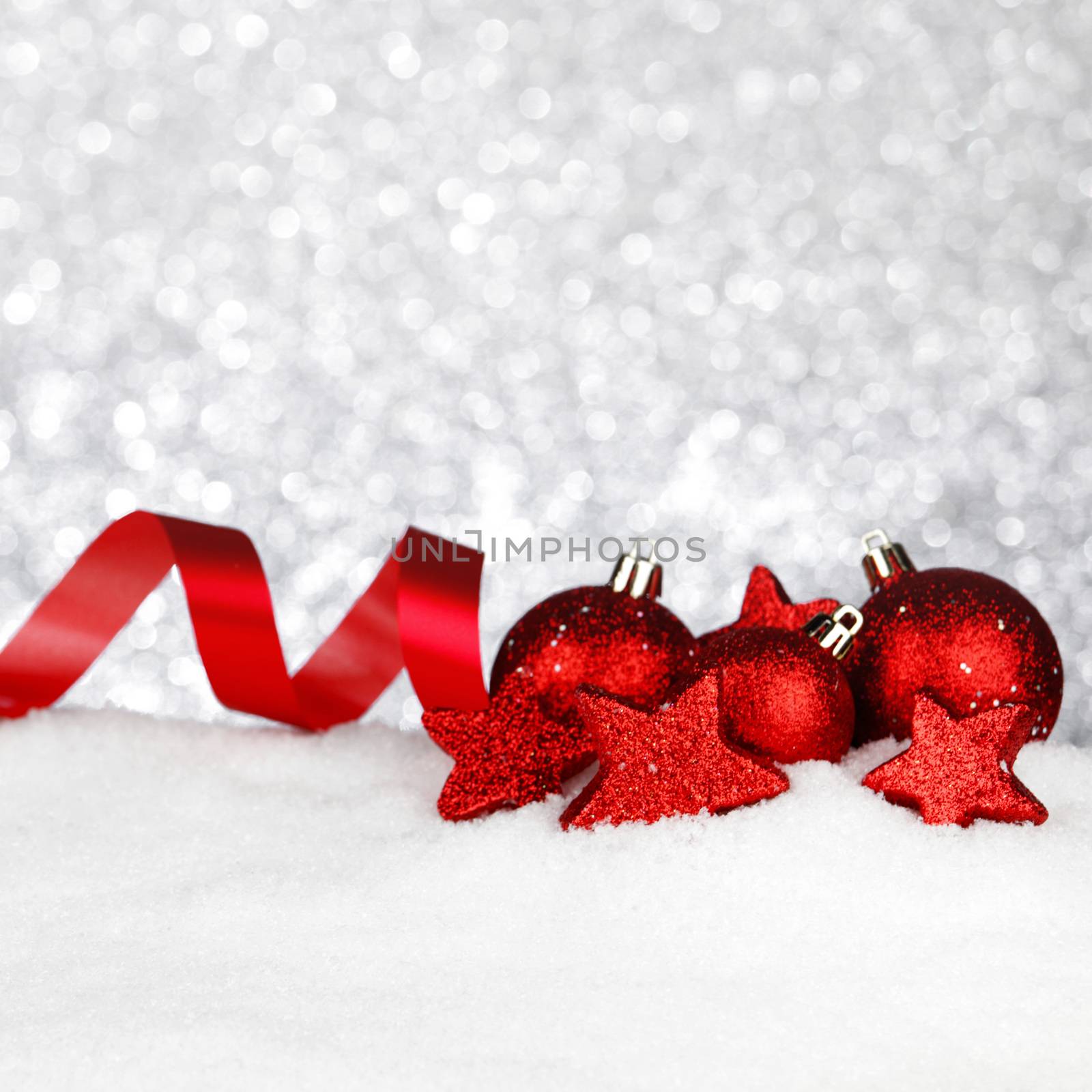 Beautiful various christmas decor on snow close-up