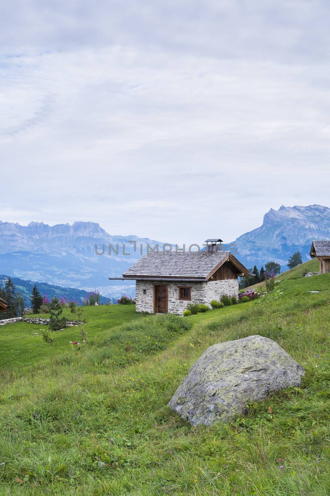 ST-GERVAIS-LES-BAINS, FRANCE - AUGUST 25: Chalet at the Truc Hostel, at bottom of the Domes de Miage mountain. This is one of the stages of the Mont Blanc Tour August 25, 2014 in St-Gervais-les-Bains.