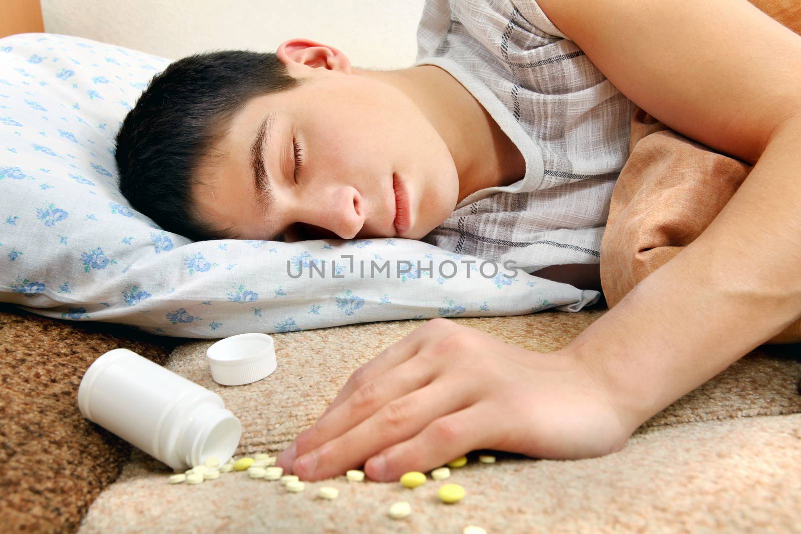 Teenager sleeps near the Pills by sabphoto