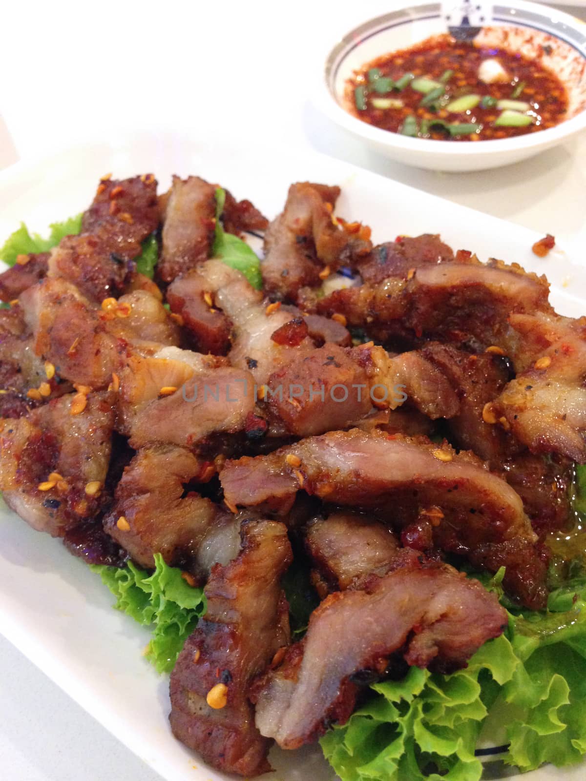 closed up spicy grilled pork , thai food
