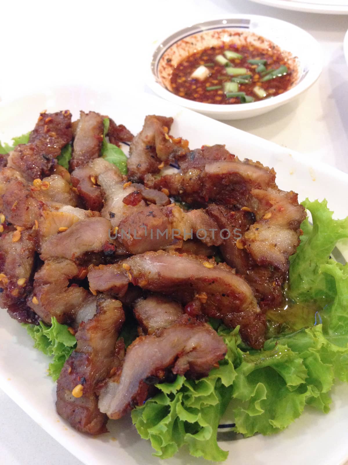 closed up spicy grilled pork , thai food