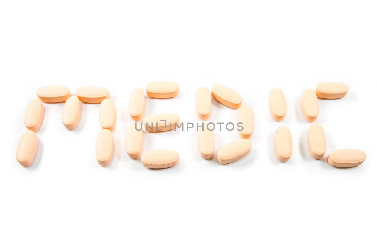 Word medic made with medicine pills by kasinv