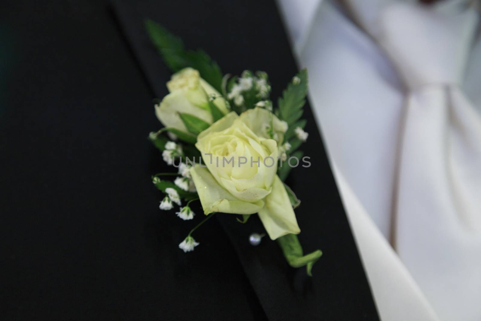 Off White Boutonniere by fallesenphotography