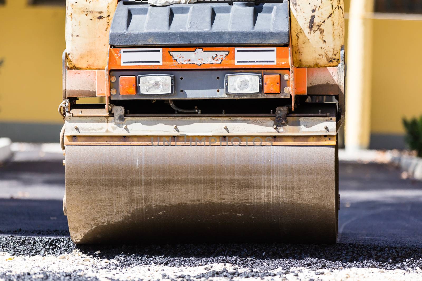 Heavy machiners construction works during asphalting road.