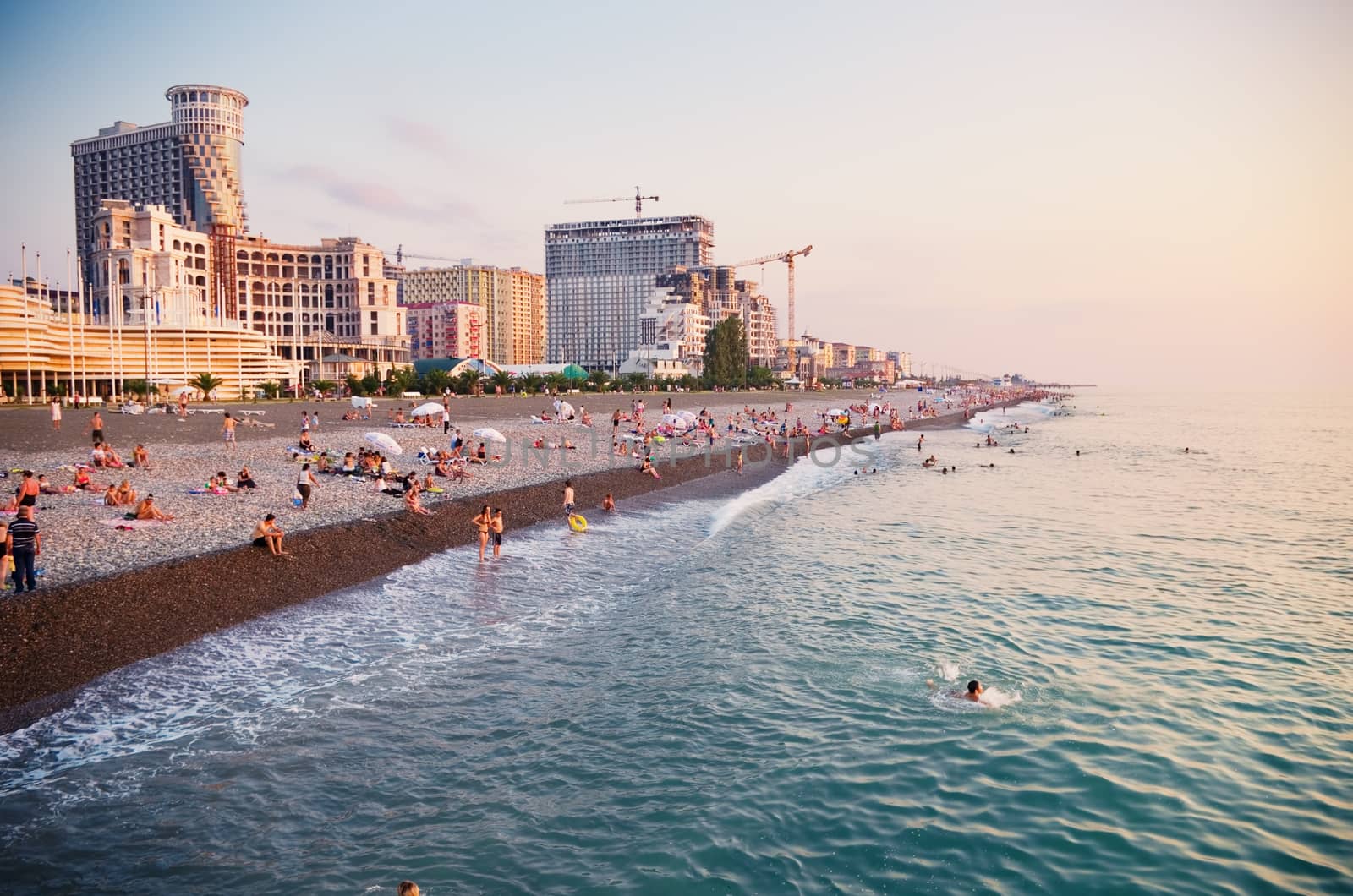 People enjoying the man made  City beach