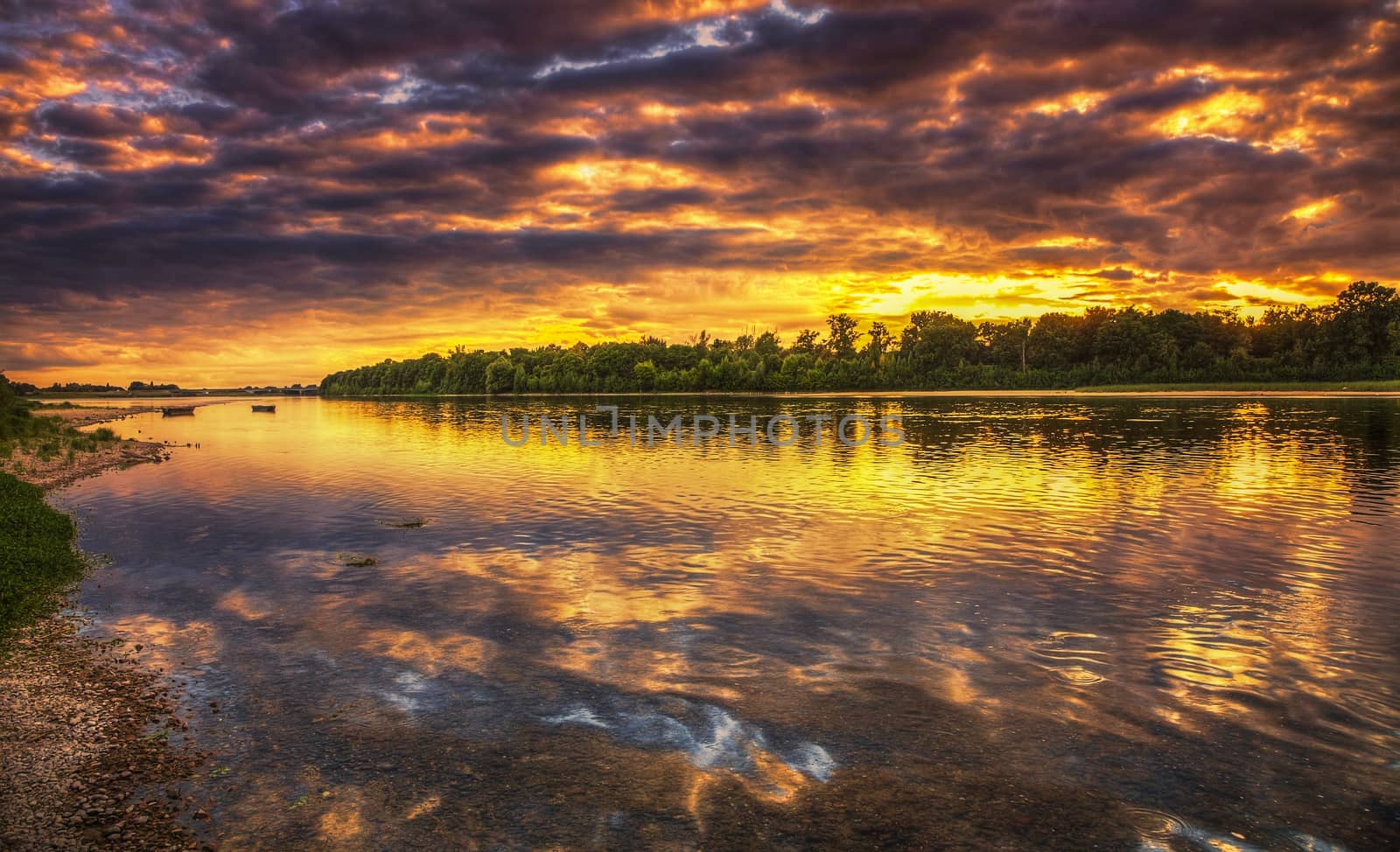 Beautiful sunset on the Loire River located in the Central France. Allong this river is the famous Loire Valley where are some of the most famous castles in the world.HDR image.