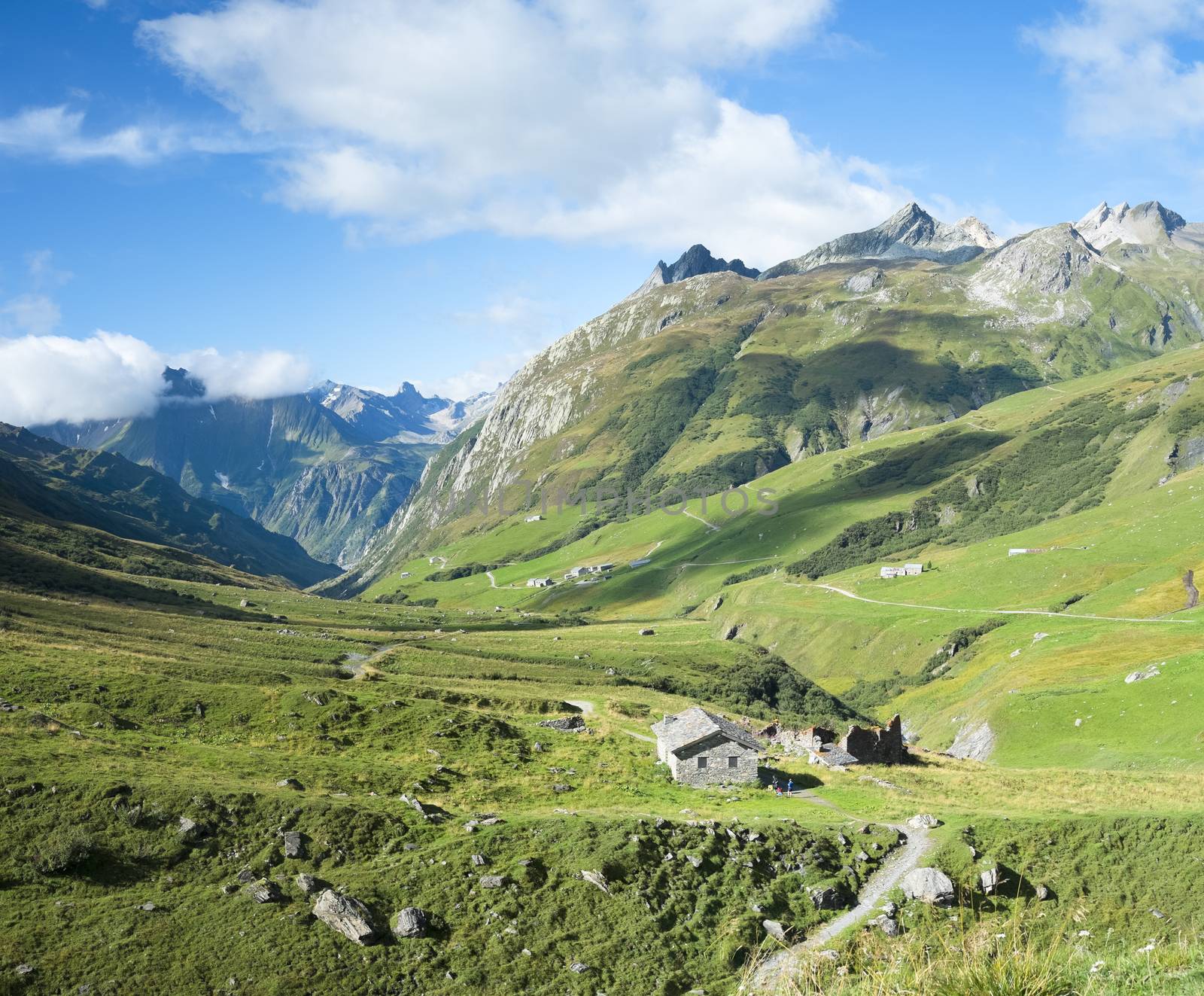 VILLE DES GLACIERS, FRANCE - AUGUST 27: Composite of Glaciers Village with chalets. The region is a stage at the Mont Blanc tour, which crosses three countries. August 27, 2014 in Ville des Glaciers.