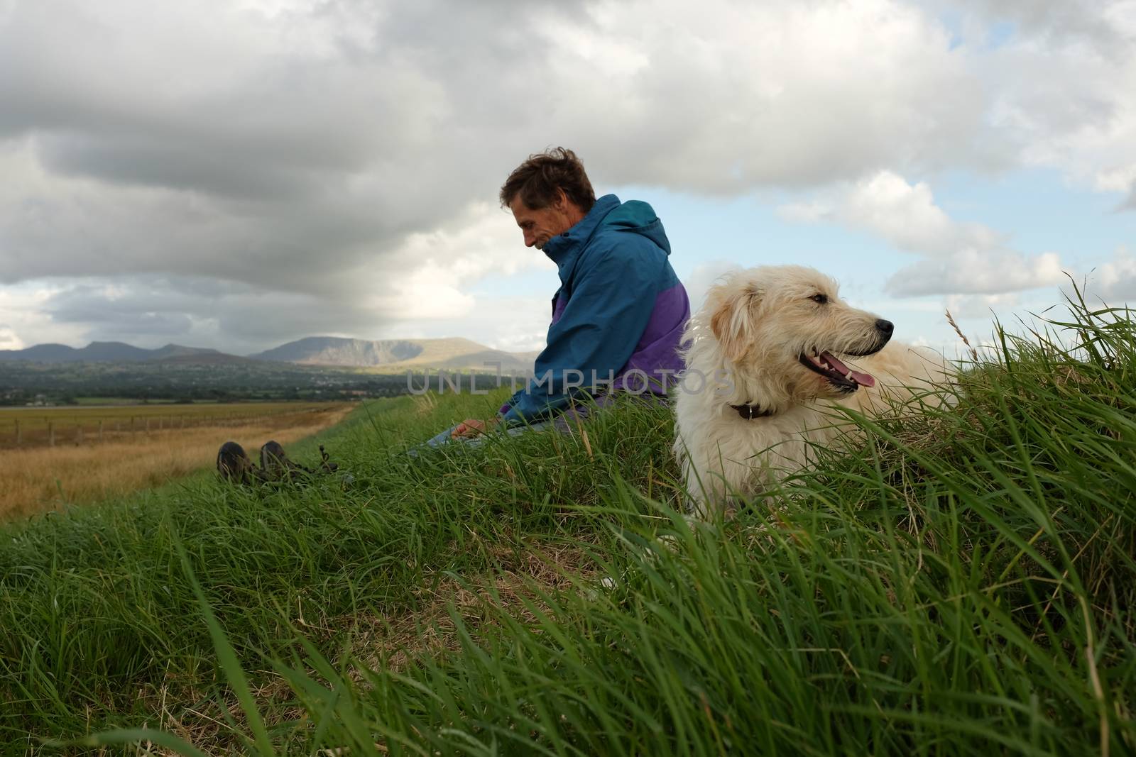 Labradoodle and owner. by richsouthwales