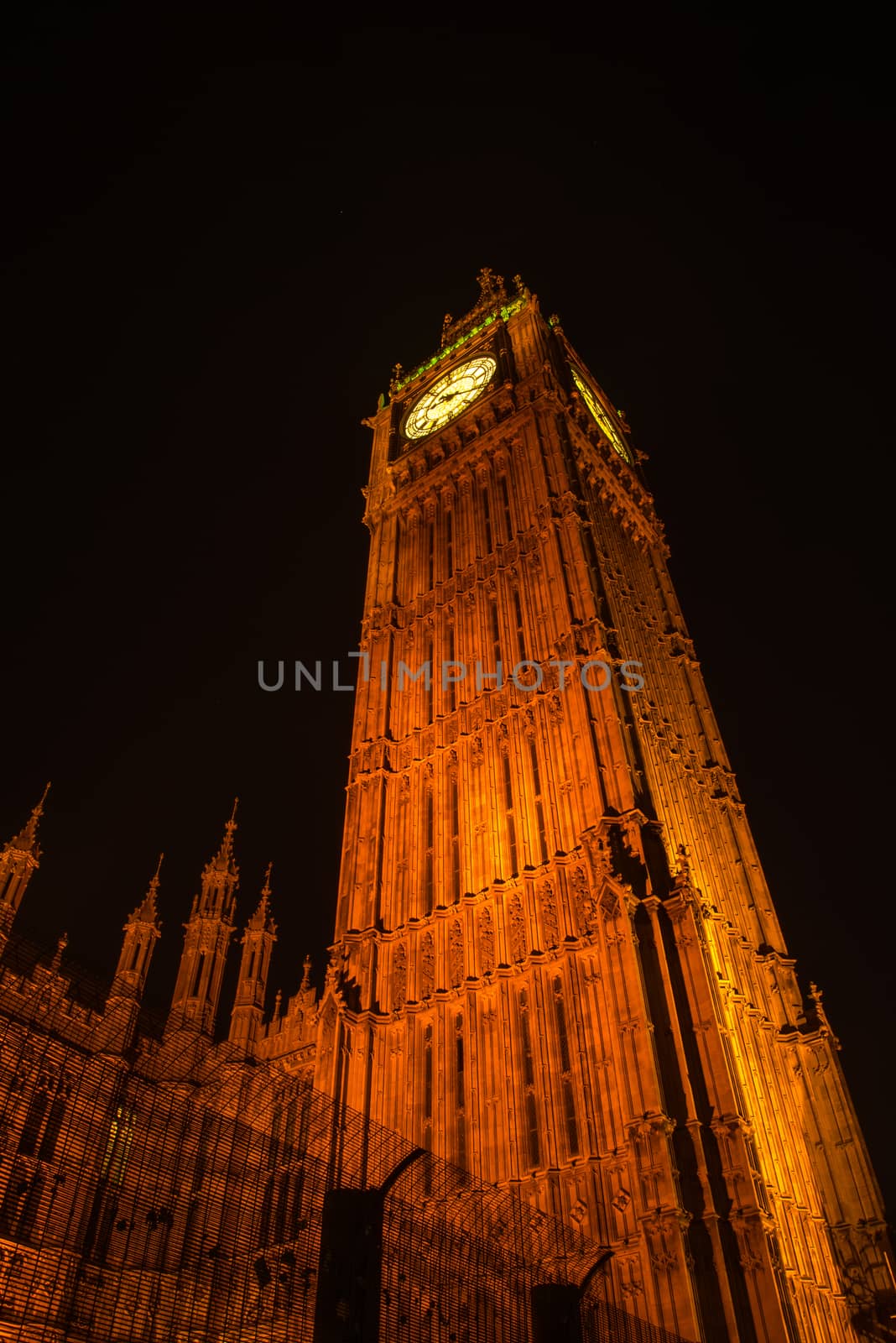 NIght view on London most famous landmark Big Ben and Parliament House on river Thames