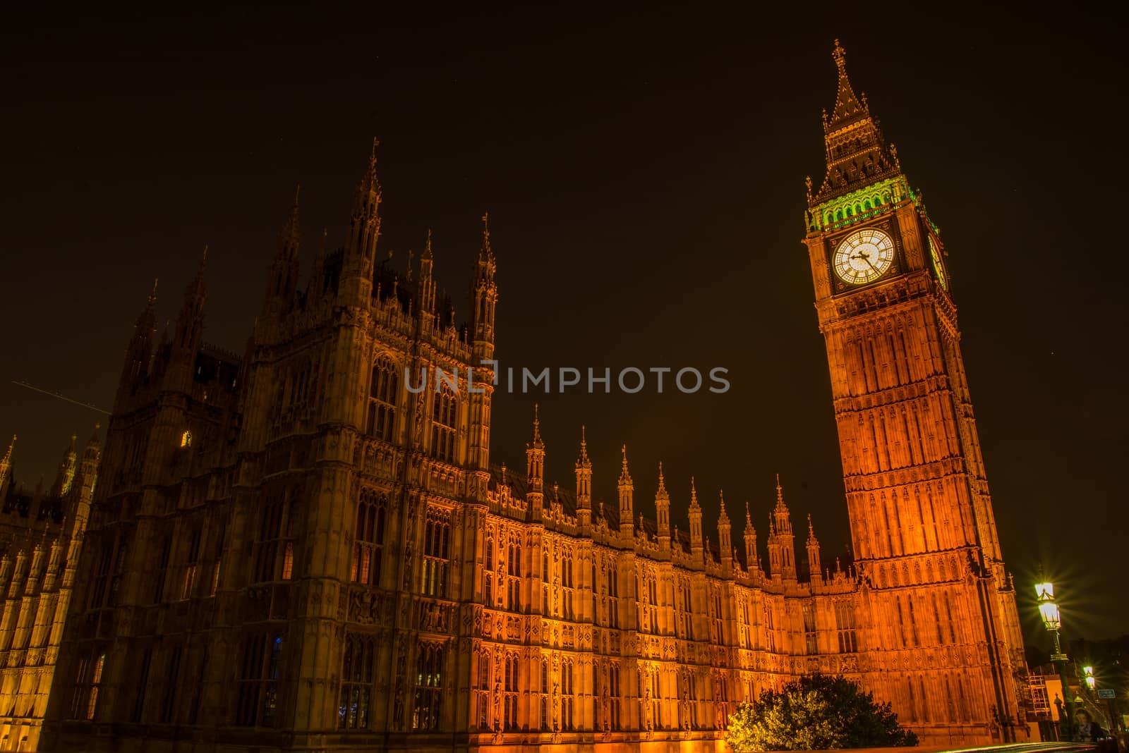 NIght view on London most famous landmark Big Ben and Parliament House on river Thames