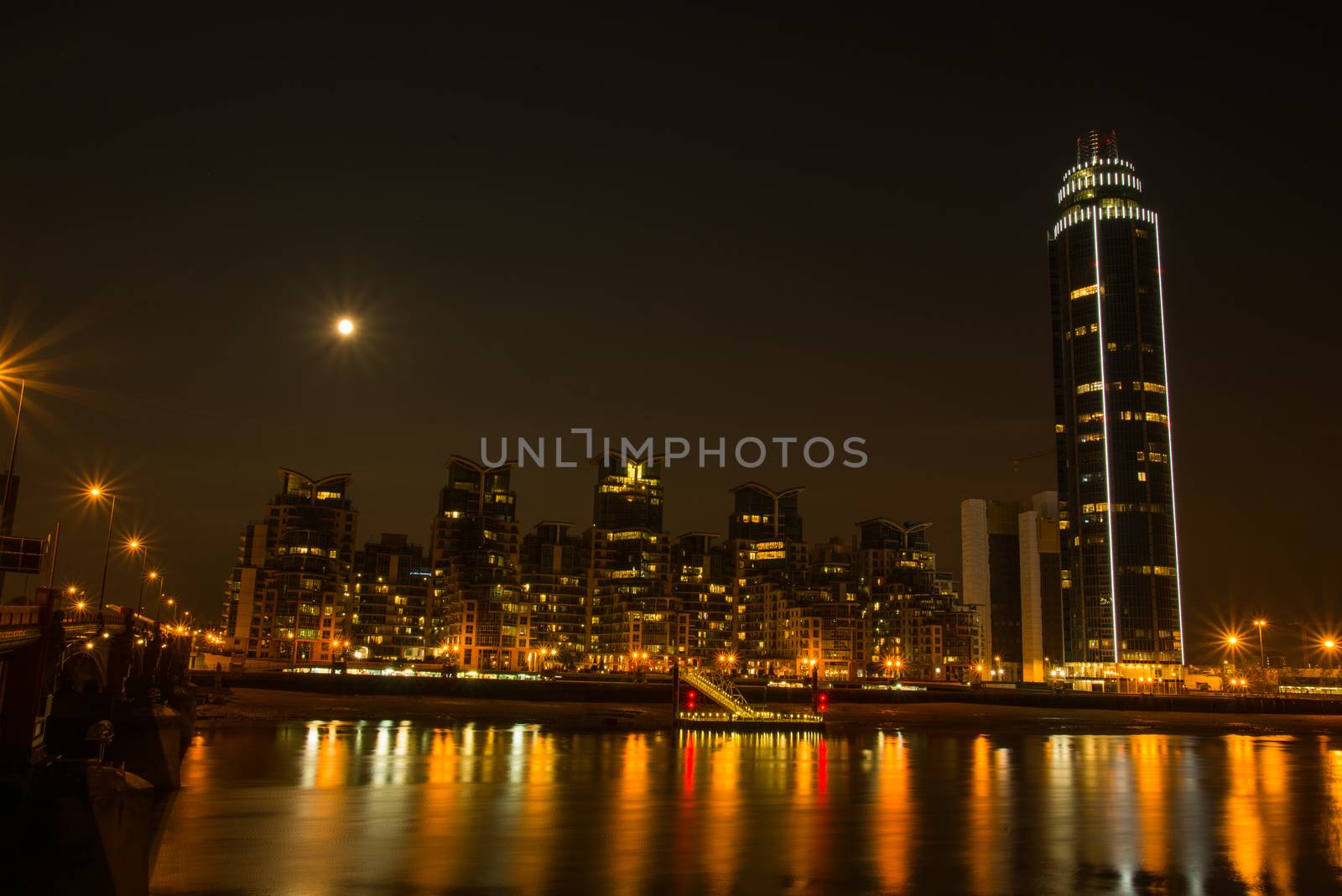 Night view on London bussines skycrapers on Thames bank in Southwark