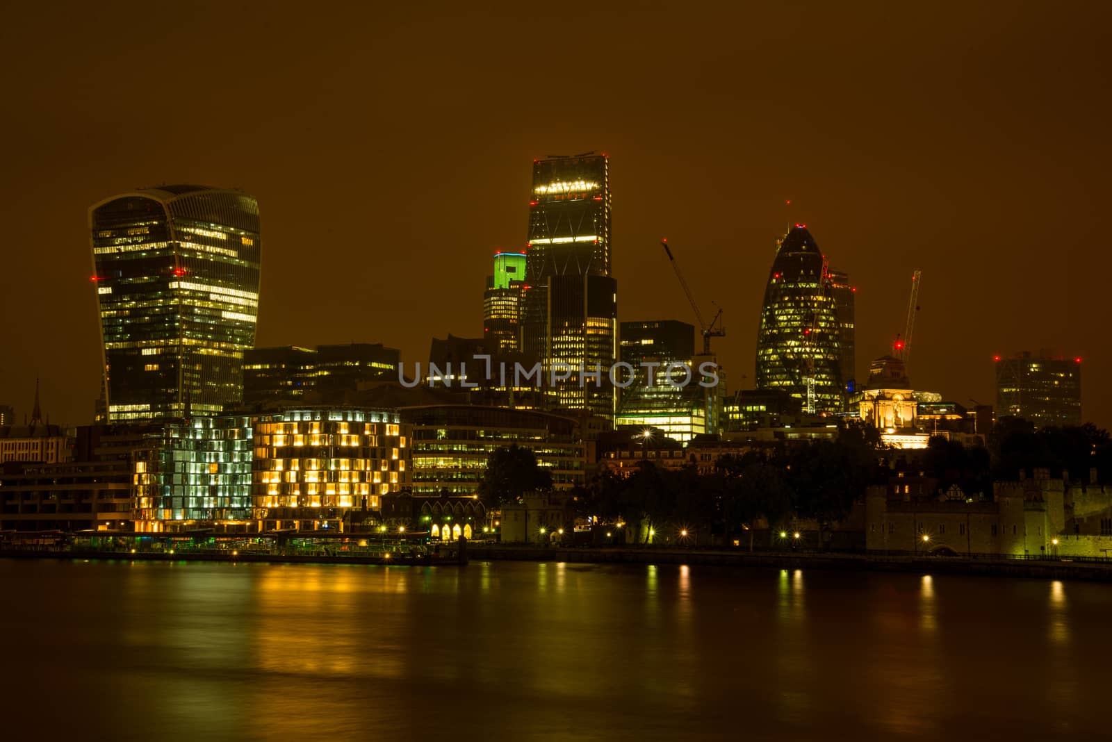 Night view on London bussines skycrapers on Thames bank in Southwark