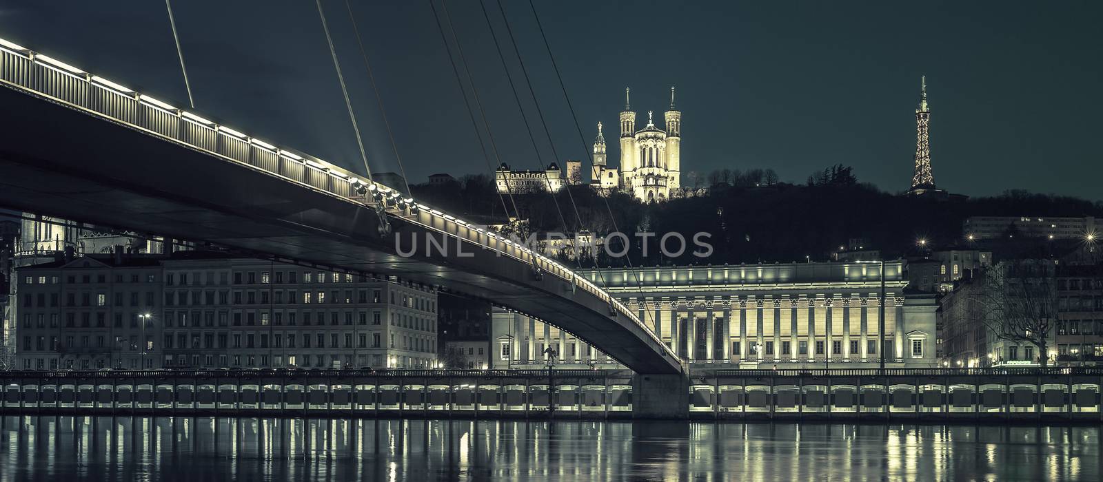 View of Saone river at Lyon by night, special photographic processing, France